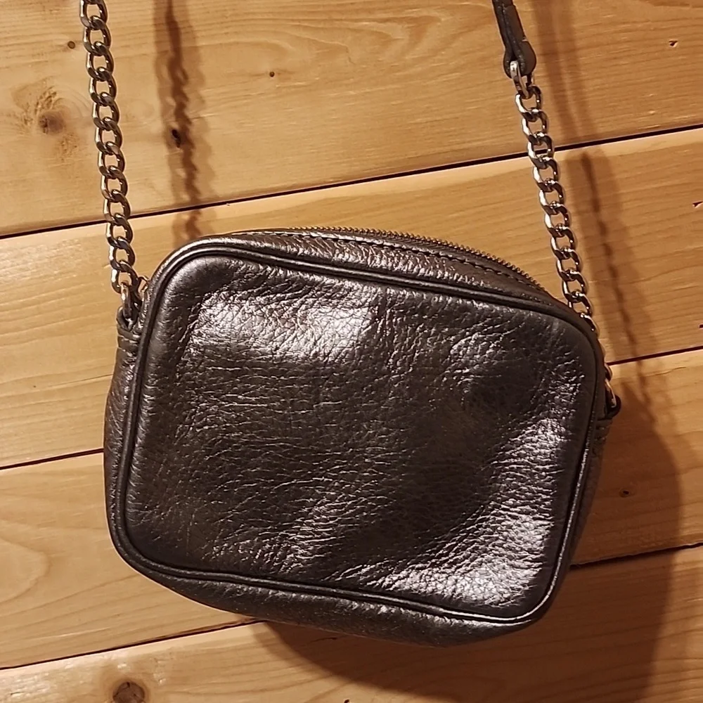 Woman’s Michael Kors crossbody bag bag,size Mini Silver
